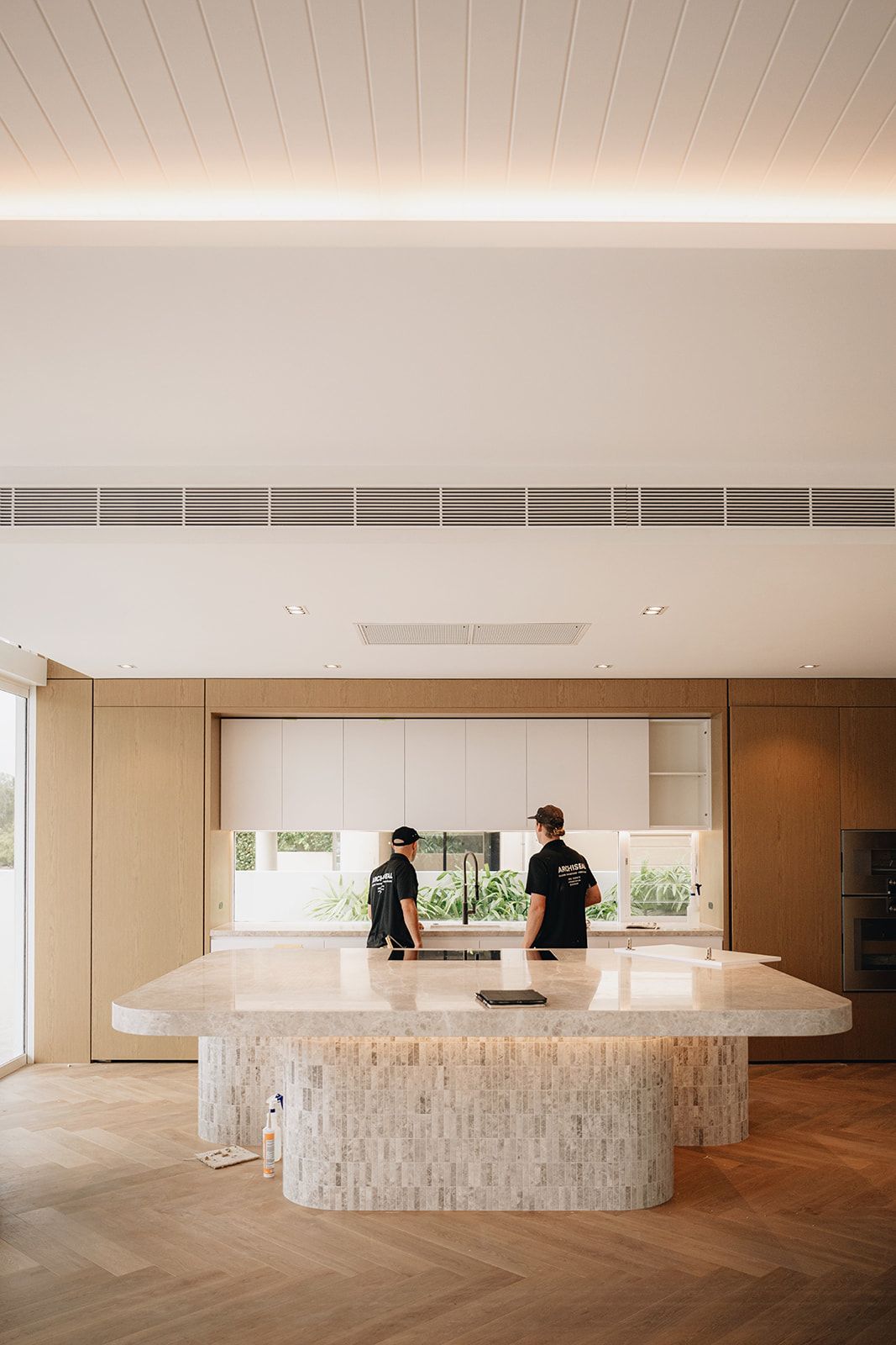 ARCHISEAL team sealing a luxury stone kitchen island