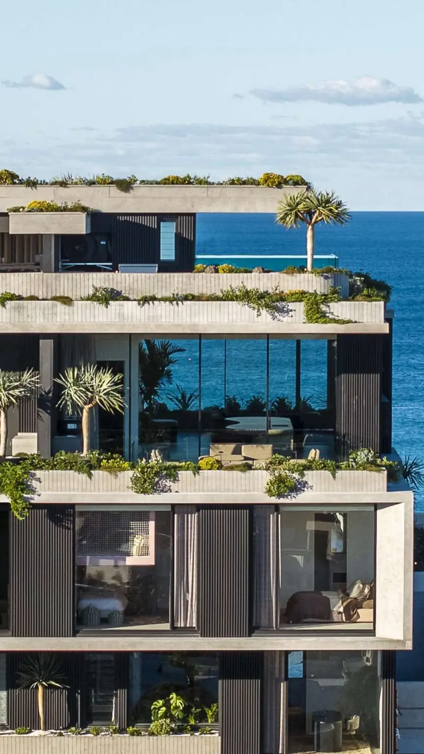 Beachfront luxury apartments with landscaped terraces